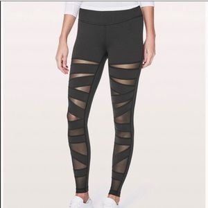 Black criss cross lululemon leggings with mesh